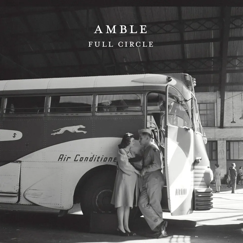 Full Circle single artwork: vintage photo of a couple kissing beside a Greyhound bus